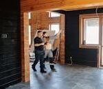 Kitchens by Frankie recommended two kitchen installers for home renovation in a partially constructed modern wooden interior.